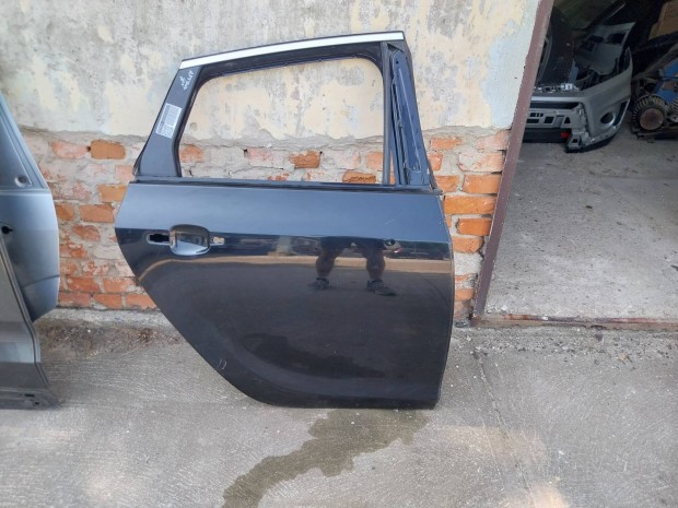 Opel Astra J ferdehátú bal hátsó ajtó