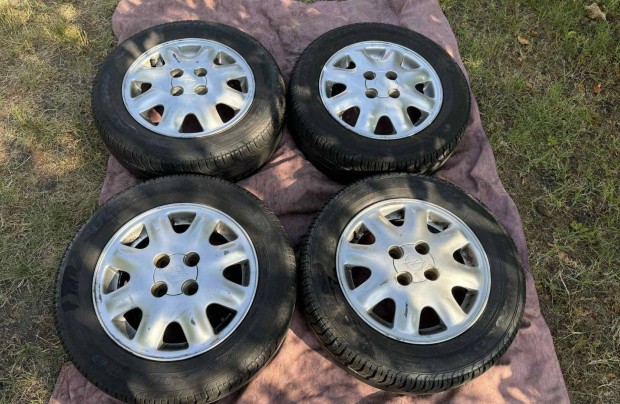Opel GM alufelni 4x100 Fulda 195/60 R14 gumikkal
