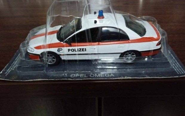 Opel Omega Swajci police kisauto modell 1/43 Elad