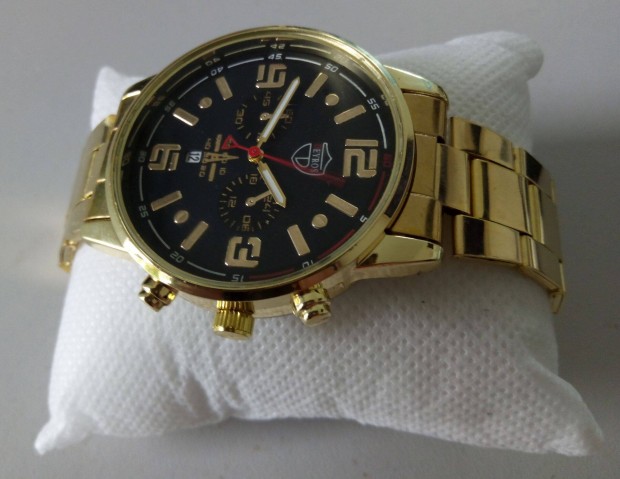 Óra férfiaknak! Új! Pontosan működik. Dobozával. Strapára. Tok: 42mm