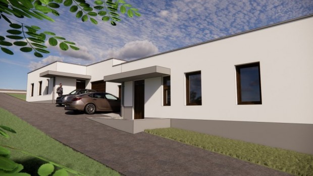 P�cs - R�zsadombon 122 nm-es egy szintes �j �p�t�s� ikerh�z