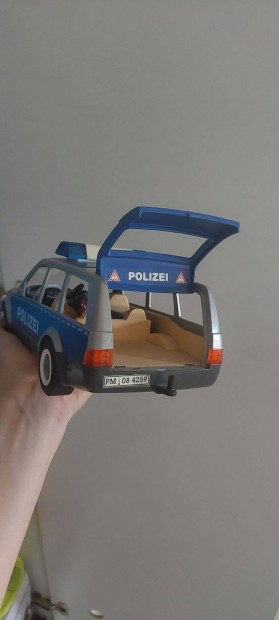 Rendőrautó, német játék, villog, nyitható, figurákkal