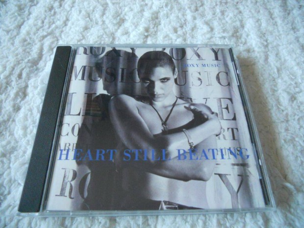 Roxy Music : Heart still beating CD ( USA)