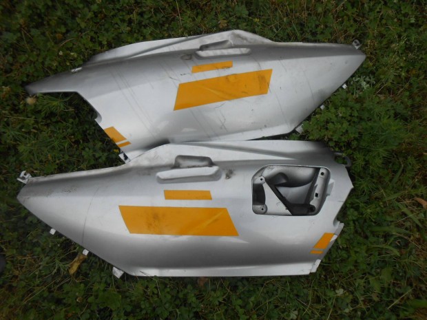Suzuki Burgman 650,2004-esről :sérűlt szinrefújt műanyagidomok