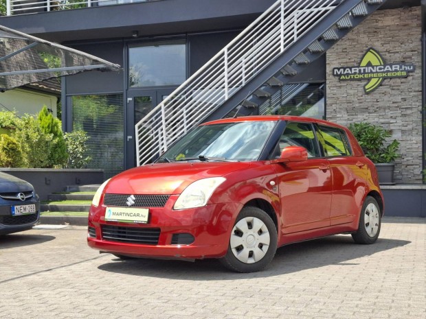 Suzuki Swift 1.3 GLX Garnet Orange Metallic +Er...