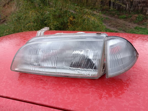 Suzuki Swift bal oldali f�nysz�r� indexel egy�tt 