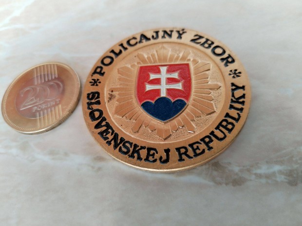 Szlovk Rendrsg aranyozott plaketje