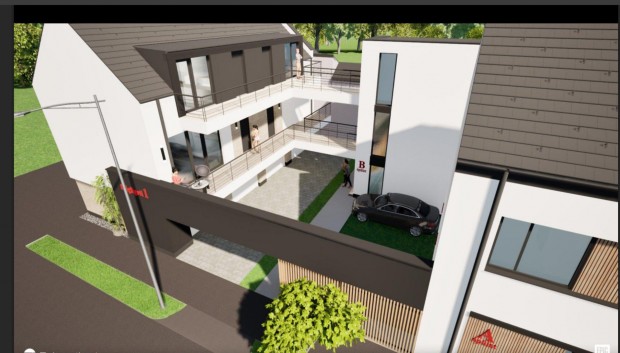 Szombathely belv�ros�ban 55 m2-es + 47 m2 el�kertes �J �p�t�s� lak�s