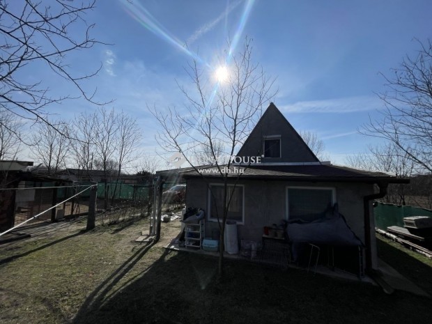 T�pi�szentm�rtoni elad� 57 nm-es h�z