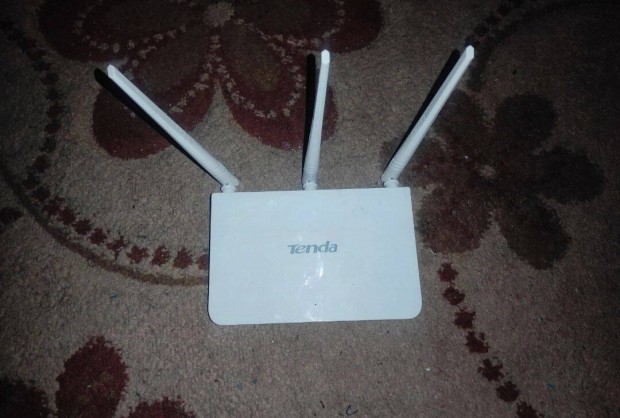 j Tenda Router