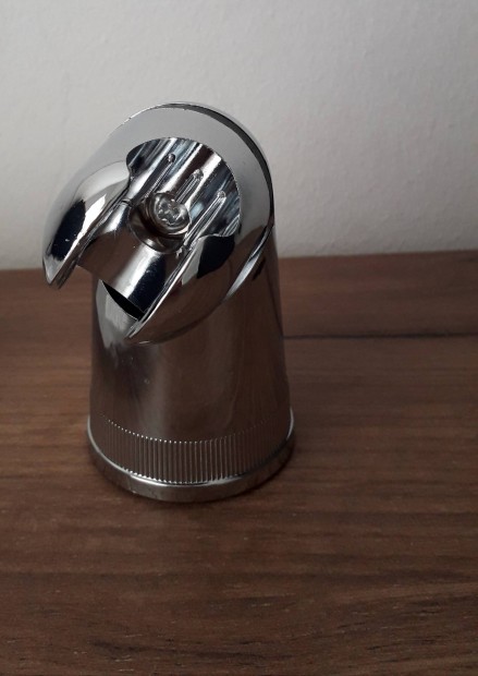 Új fényes műanyag zuhanyfej tartó. Beépítésből kimaradt