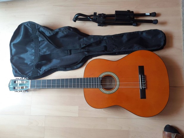 Új gitár tokkal állvánnyal dobozában