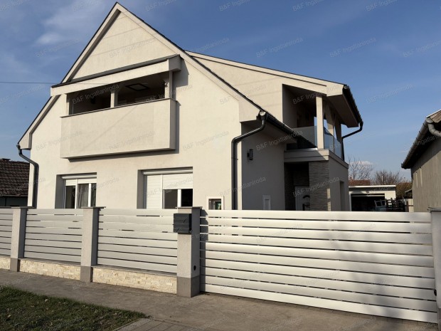 �jszer� 156 m2-es t�gla csal�di h�z, gar�zzsal