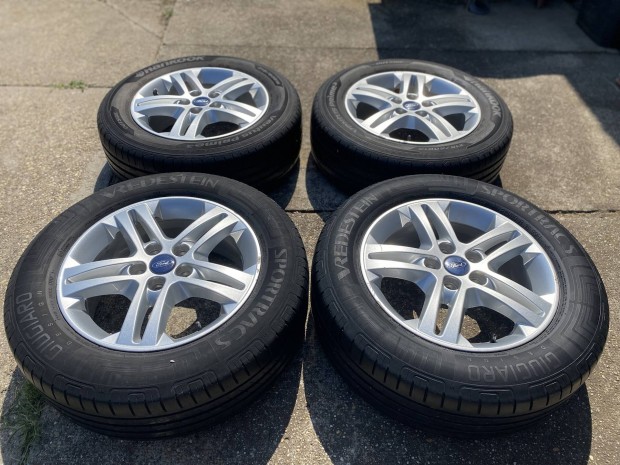 Újszerű Ford Galaxy gyári 16"-os alufelni szett 215/60R16 nyári gumi