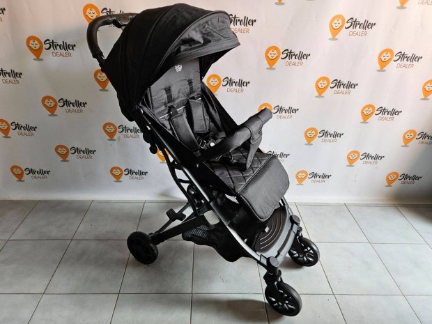 Újszerű, bőröndként húzható fekete Babycab Mailand babakocsi