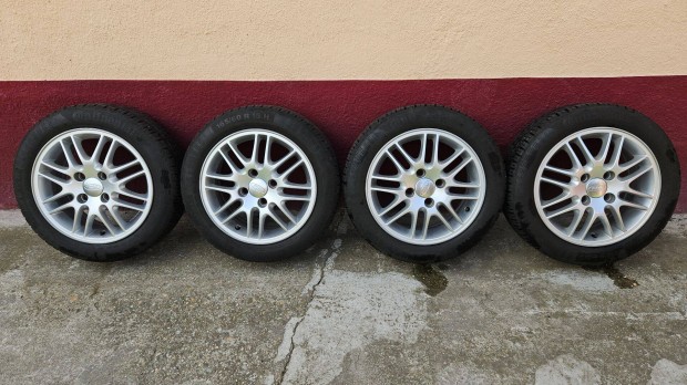 Újszerű gyári Ford alufelni + újszerű Continental gumi