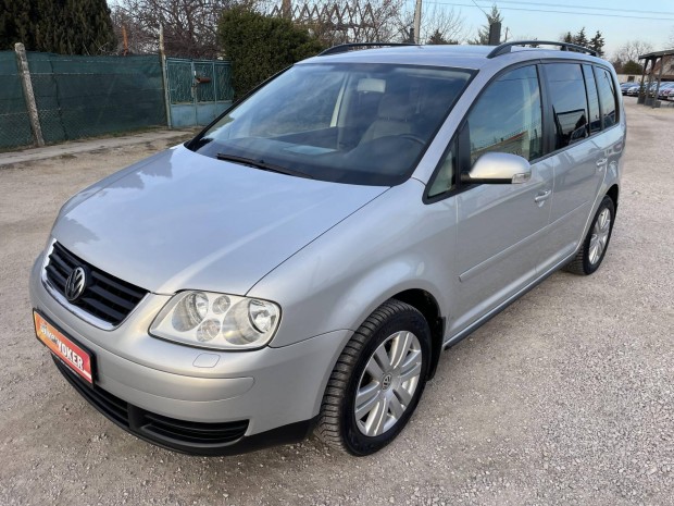 Volkswagen Touran 1.9 PD TDi Highline Vezetett...