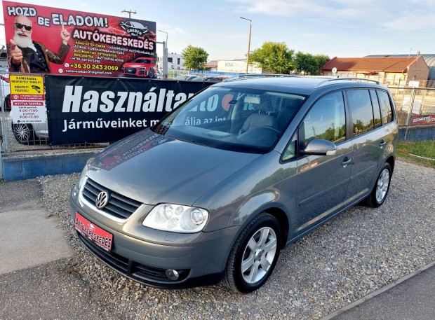 Volkswagen Touran 2.0 PD TDI Highline DSG Megkí...