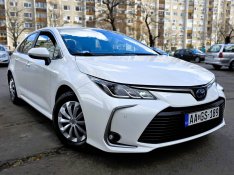 Toyota Corolla Sedan 1.8 Hybrid Comfort Busines...