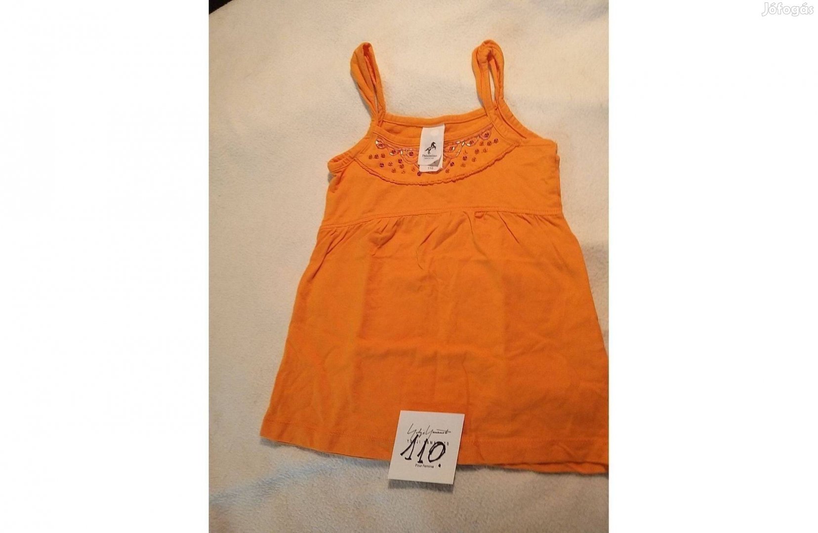 110-es méretű narancssárga vállpántos trikó kislánynak