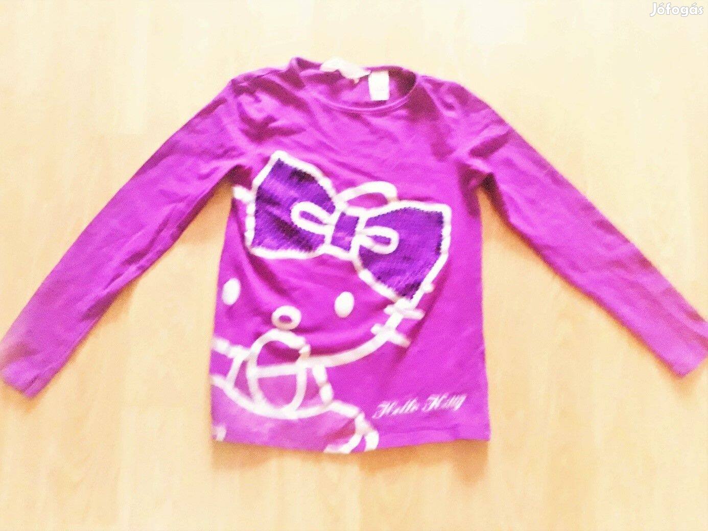 122/128 újszerű 1kéz H&M cuki flitteres Hello Kitty mintás póló felső