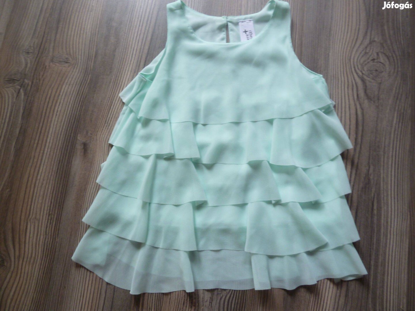 134140-es kislány felső