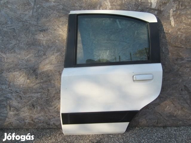 138886 Fiat Panda II. 2003-2012 bal hátsó fehér színű ajtó