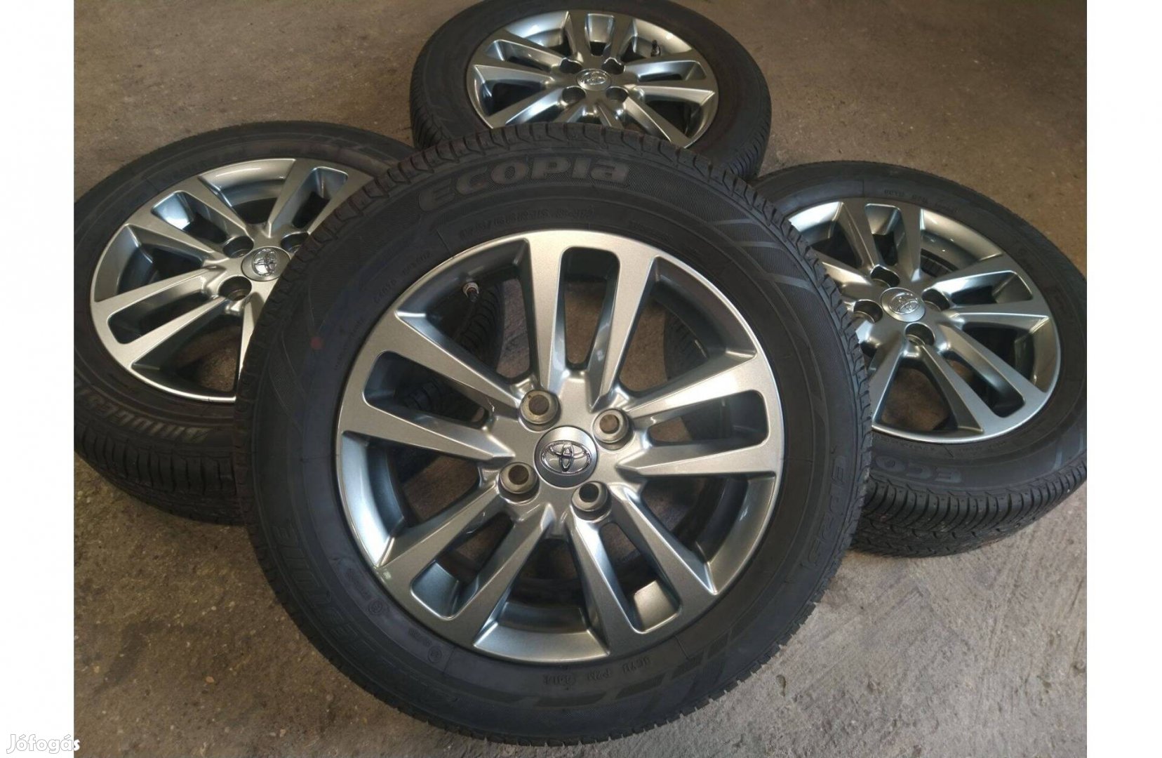 15" gyári Toyota Yaris alufelni garnitúra 4x100 Nyári Bridgestone