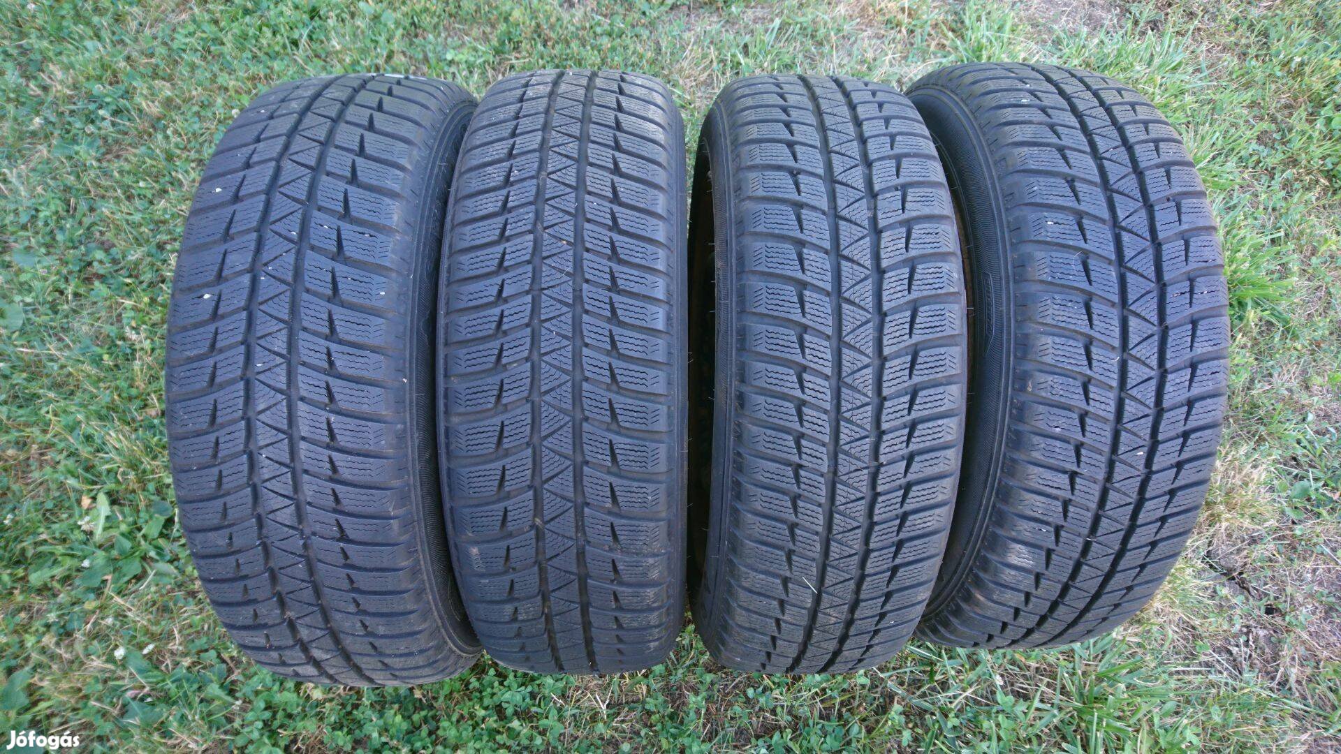185/60 R15 újszerű téli gumi szett acél felnivel