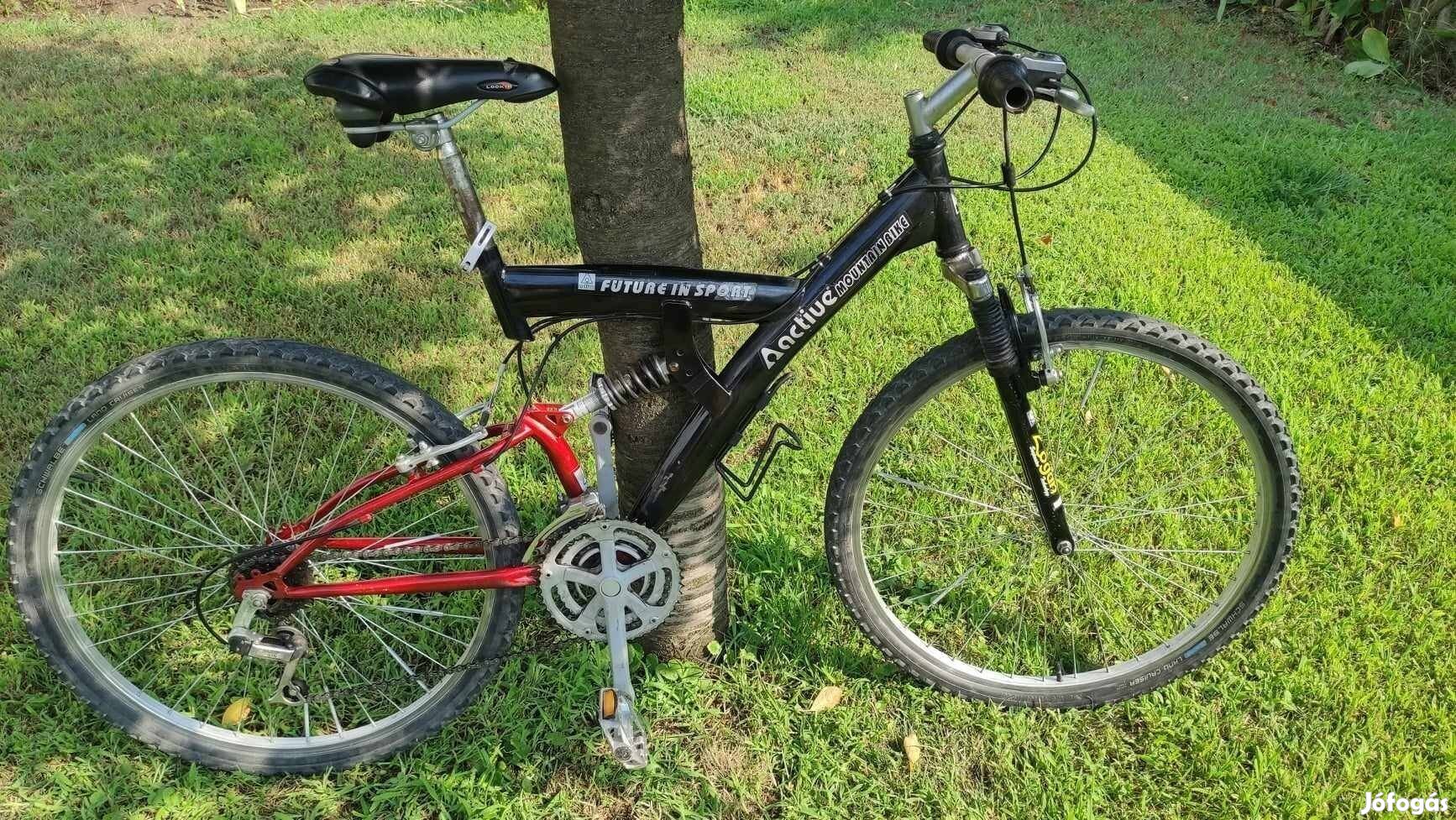 26"-os összteleszkópos MTB