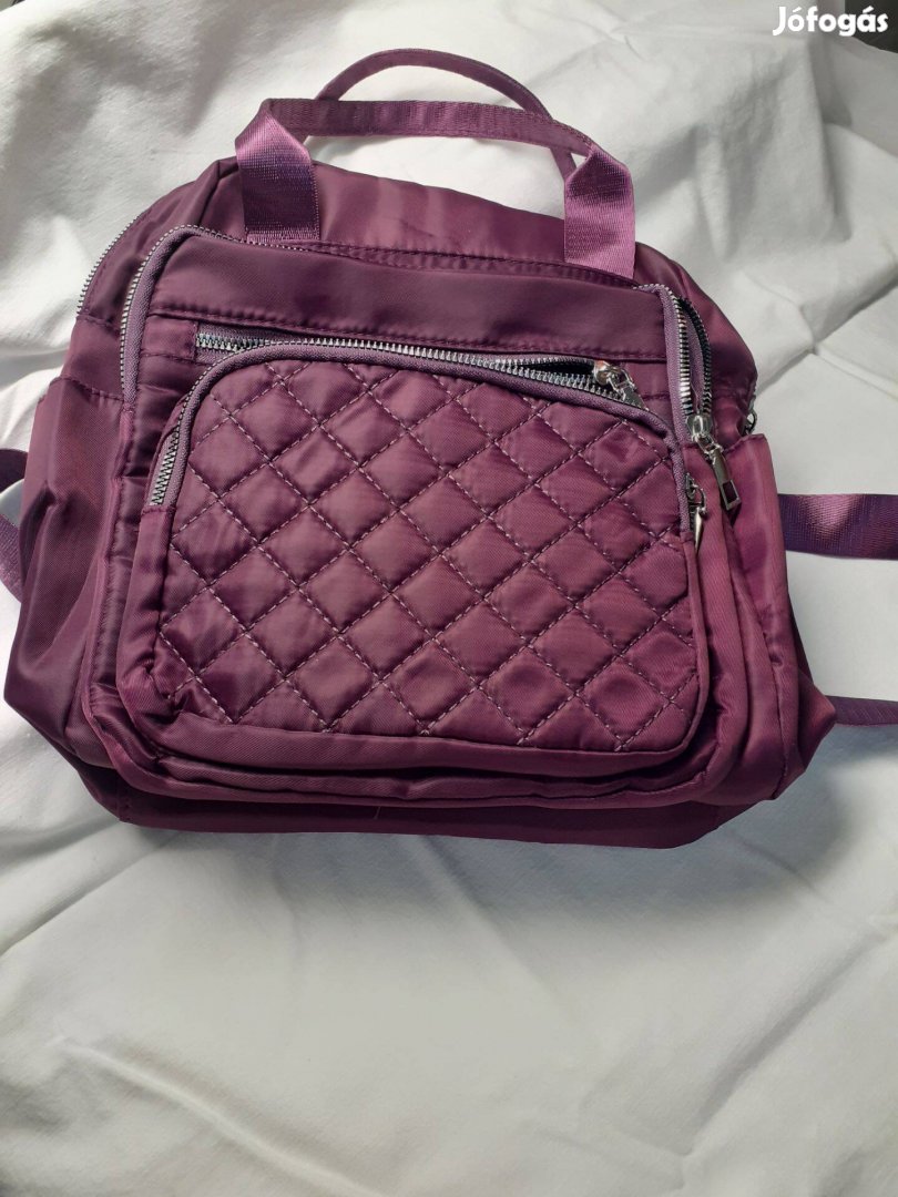 4559t Új, lila sokrészes összkomfortos táska, kézi táska, hátizsák