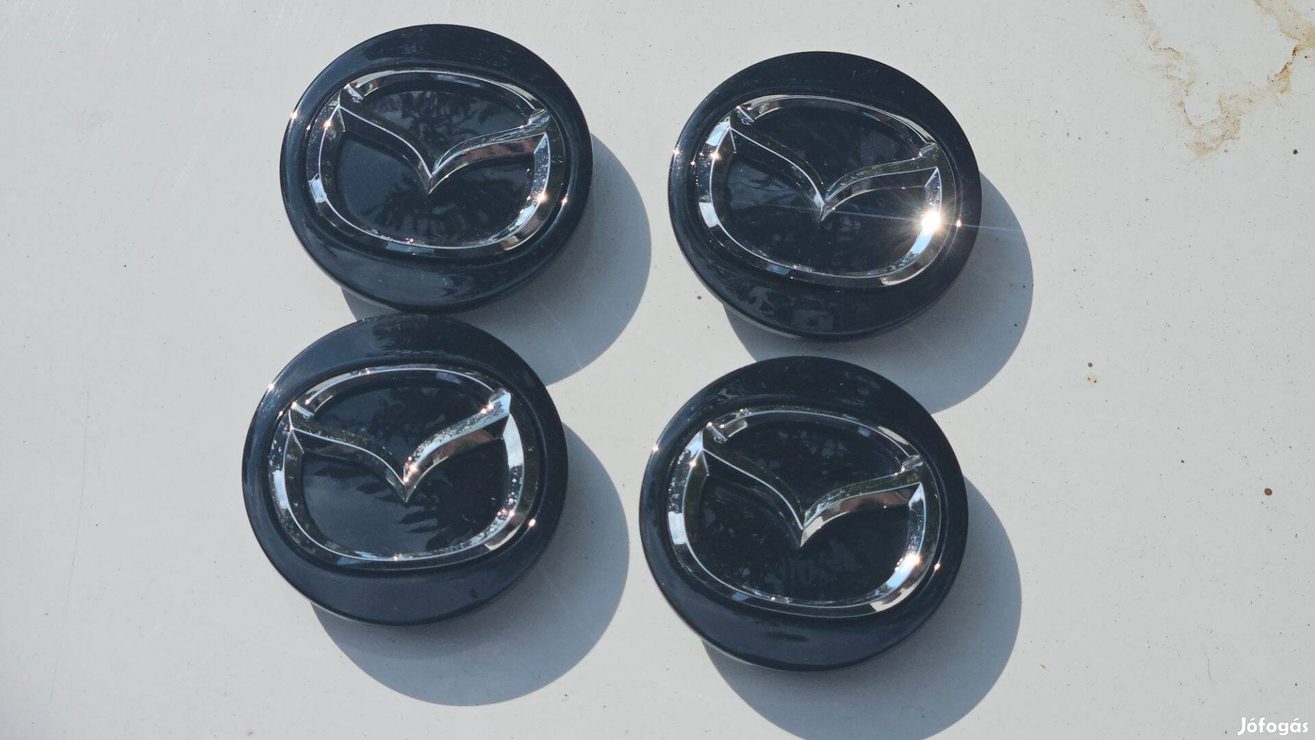 4db Gyári Mazda fekete 62mm felnikupak kupak