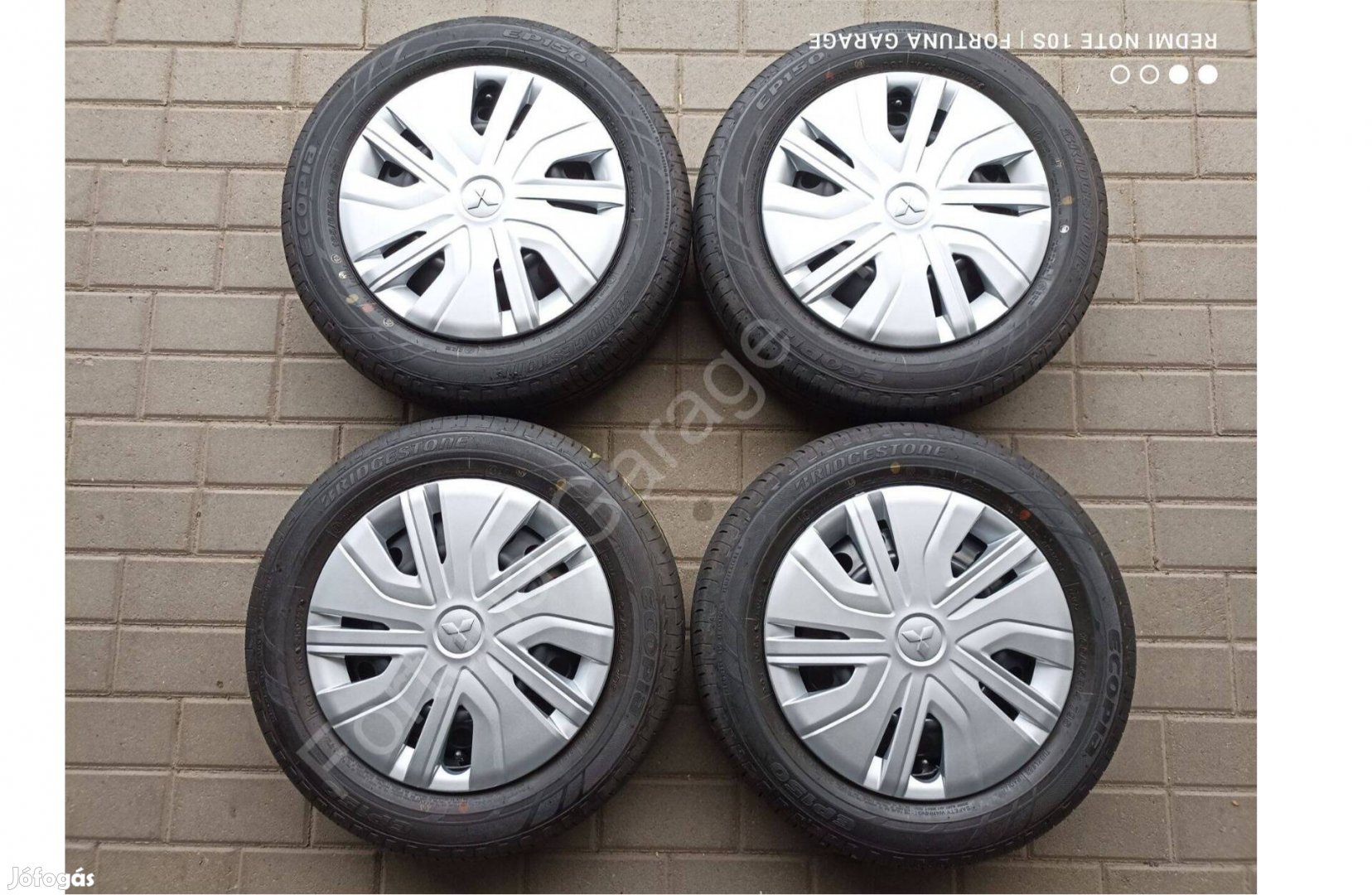 4x100 14" Mitsubishi újszerű nyári kerékgarnitúra +Tpms