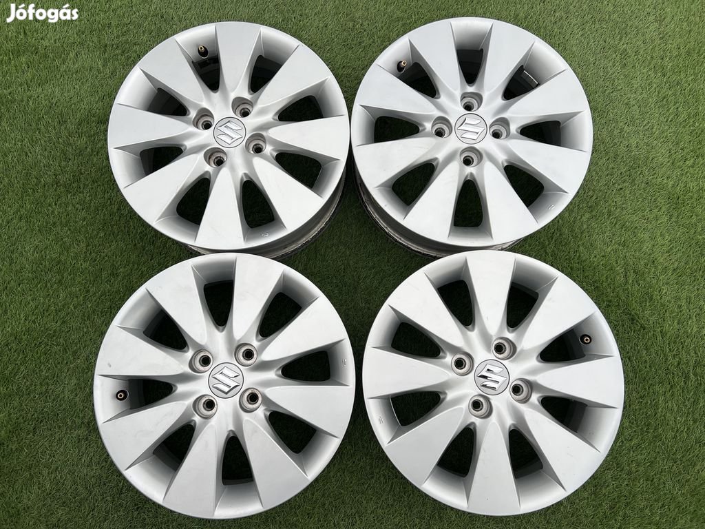 4x100 15" Suzuki gyári alufelni 5,5Jx15h2 ET50