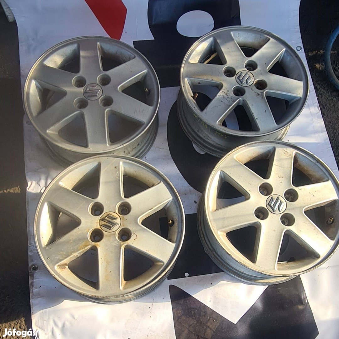 4x100 lyukosztású 5J 14" használt (gyári felni) Suzuki alufelni
