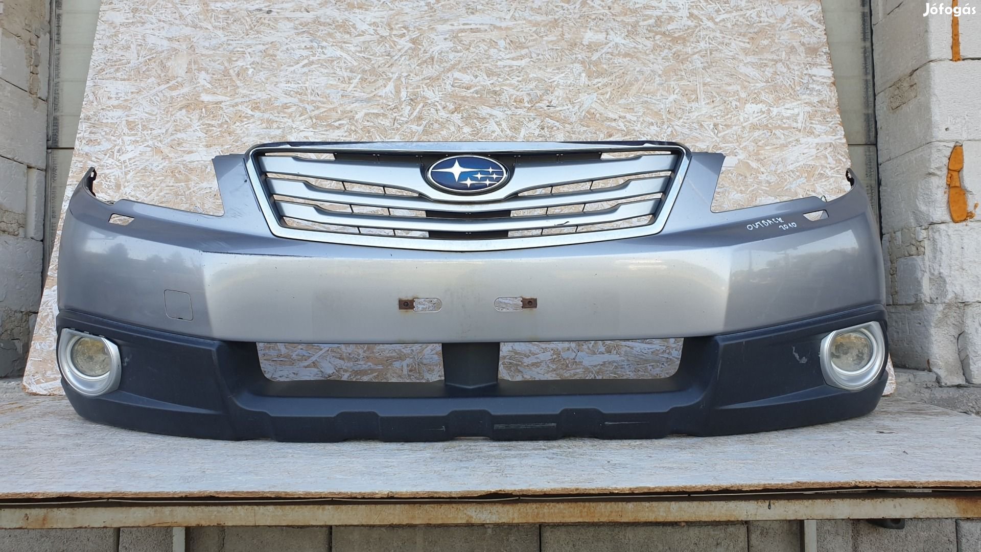 511396 Subaru Outback 2010, Mosós Ködlámpás Lökhárító. 57704AJ050.