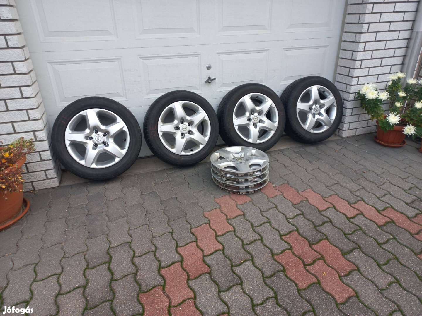5x110 16 gyári Opel struktur felni + dísztárcsa szett téli gumihoz