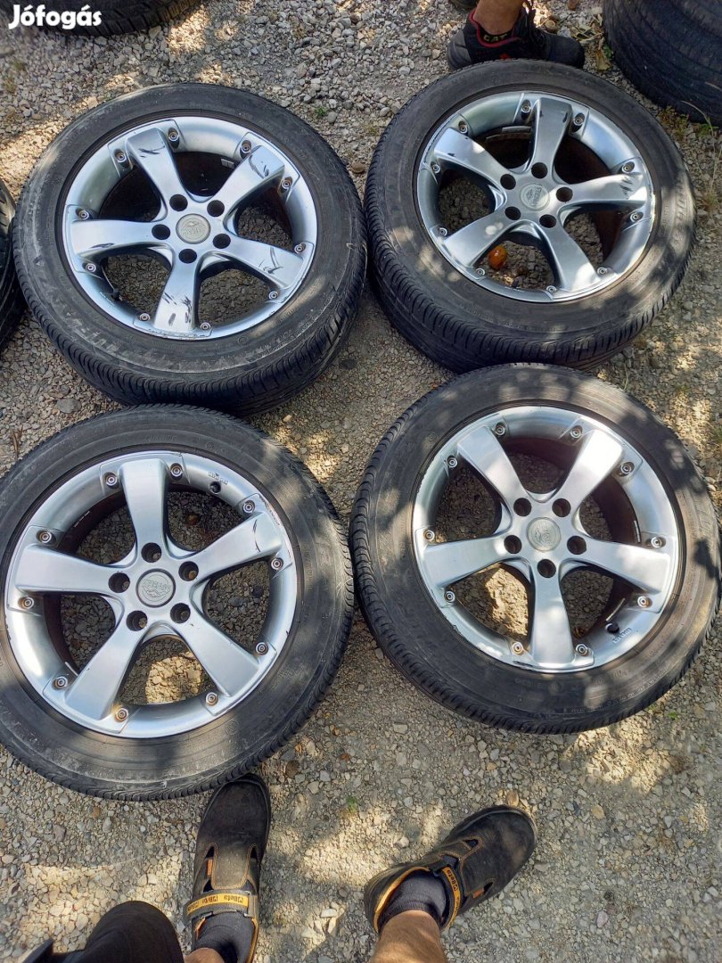 5x112 lyukosztású 16" használt Mangels alufelni, rajta 205/55 használ