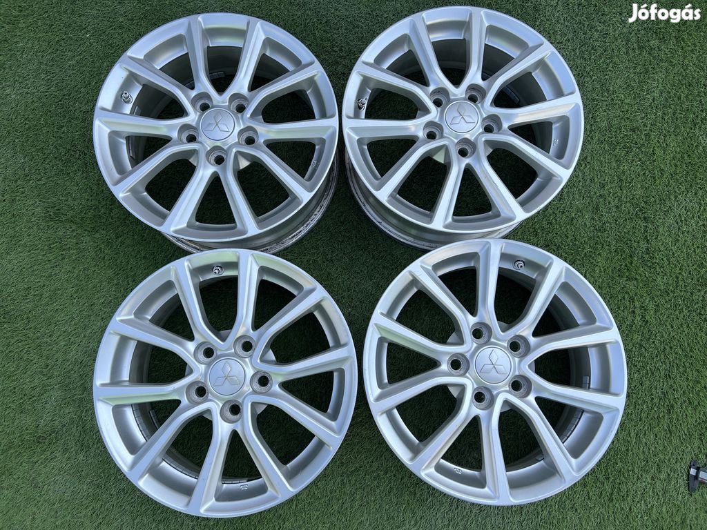 5x114.3 16" Mitsubishi gyári alufelni +TPMS szenzor 6,5Jx16h2 ET46