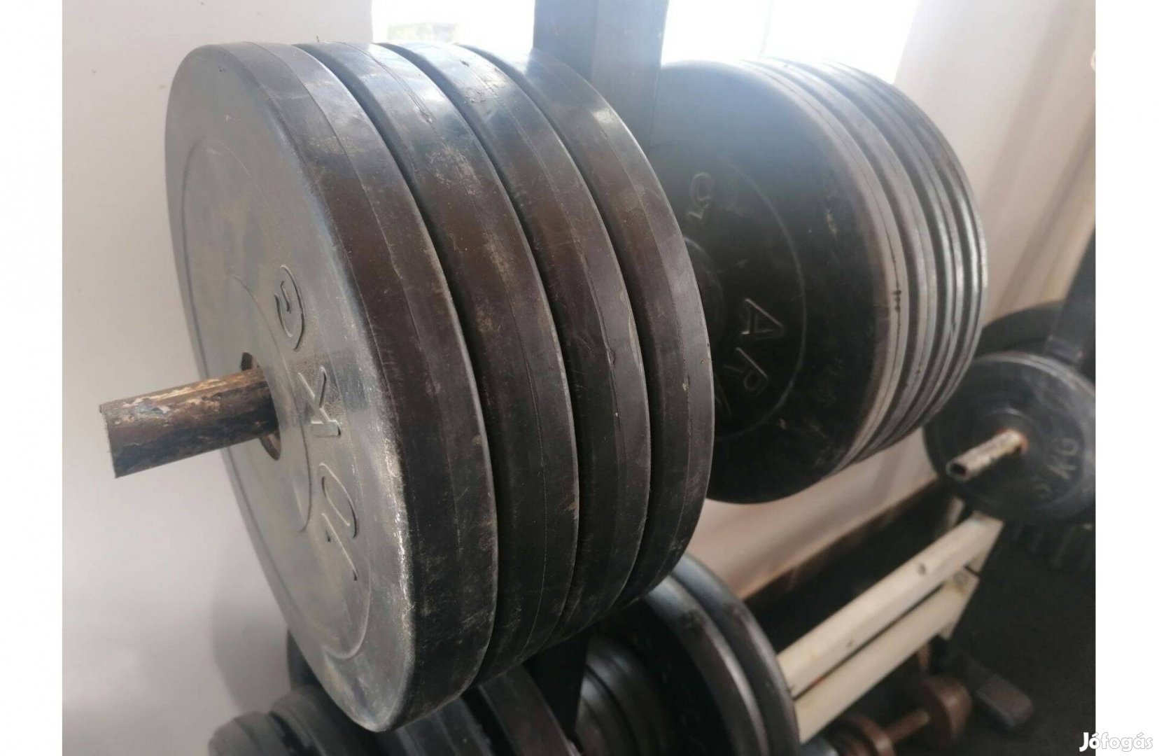 60 kg gumírozott súlyzó tárcsa, 31mm gyári súly