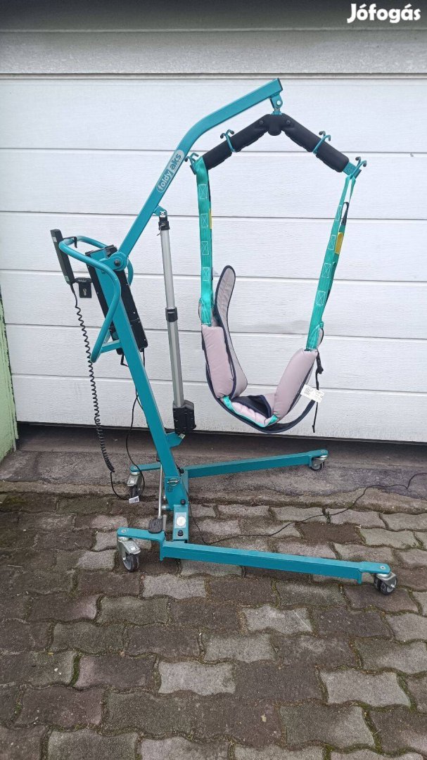 AKS Foldy elektromos betegemelő lift hámmal - 150kg-ig