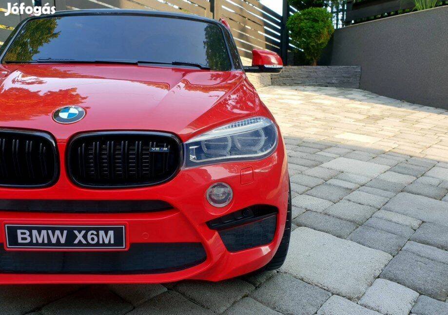 Akció! Kétszemélyes BMW X6M 12V piros eredeti lic. elektromos kisautó