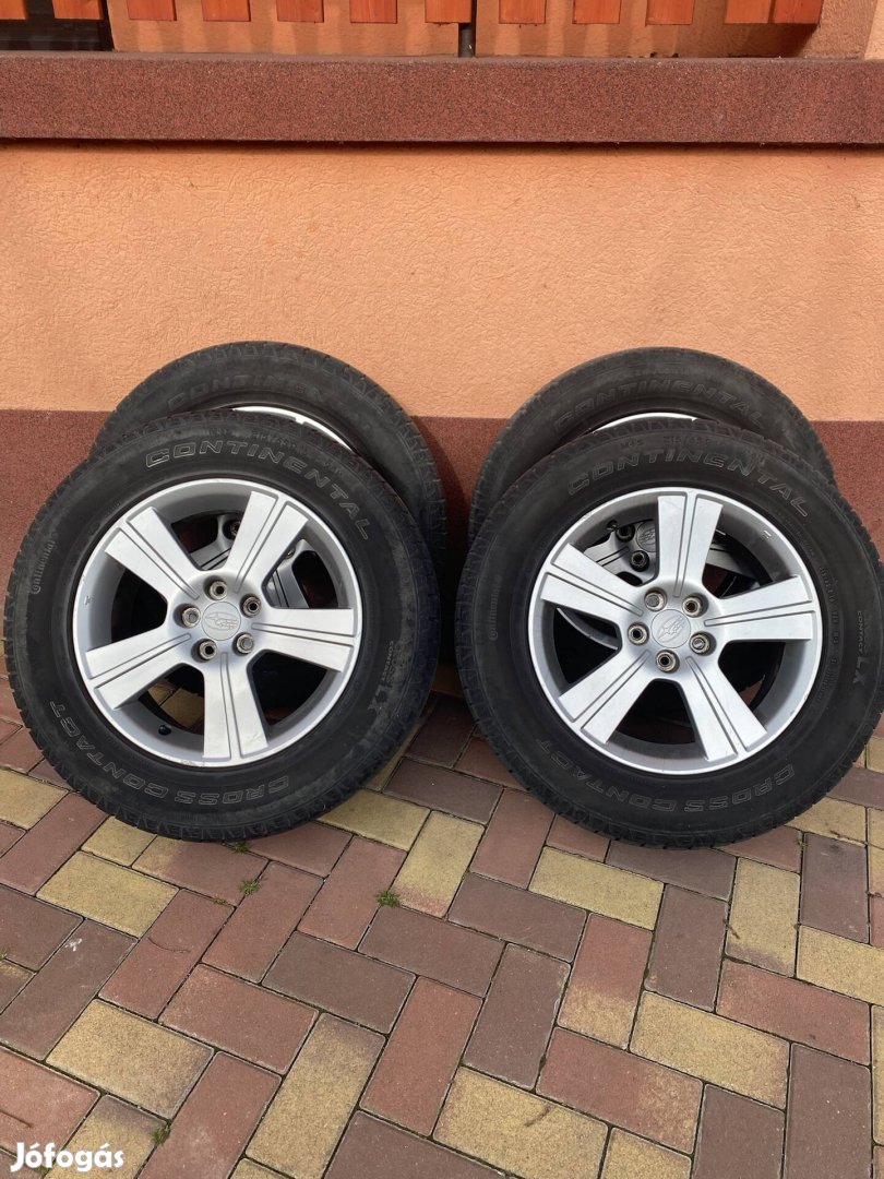 Alufelni 215/65 r16 Continental nyári gumival