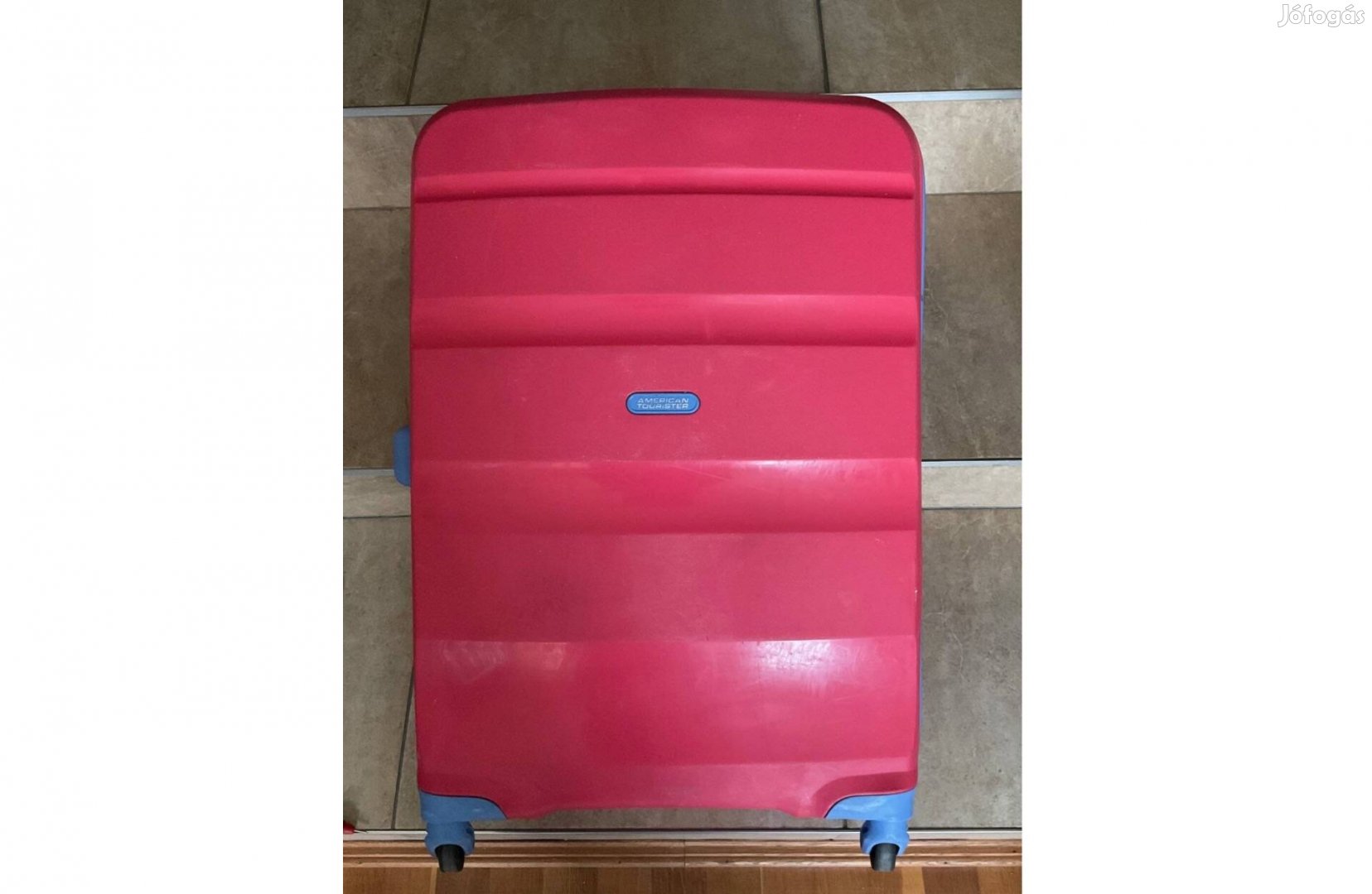 American Tourister közepes bőrönd félár alatt eladó