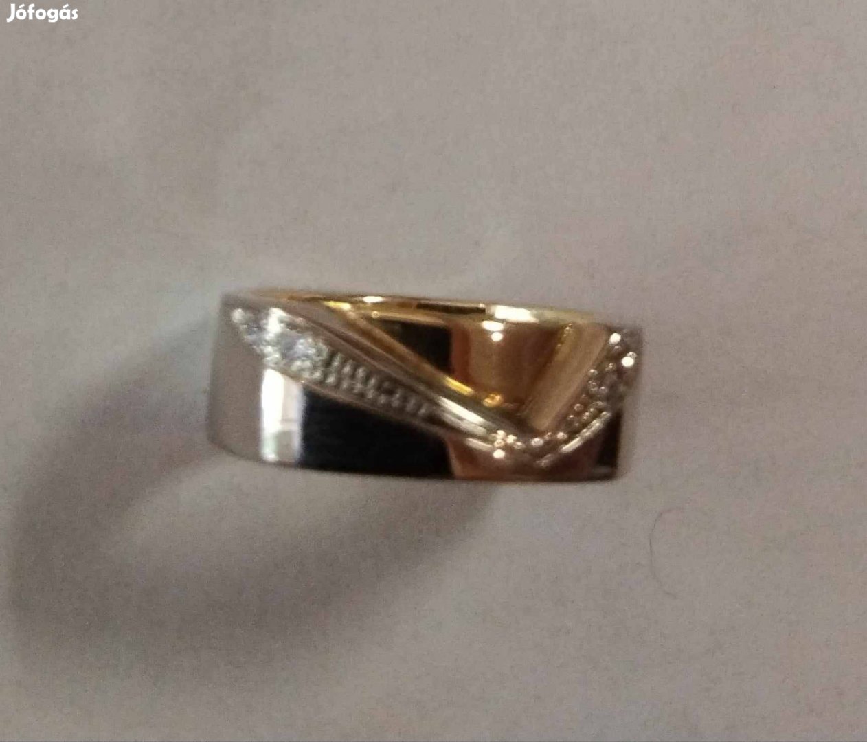 Aranygyűrű 14k több apró brillel 6.46 g elado