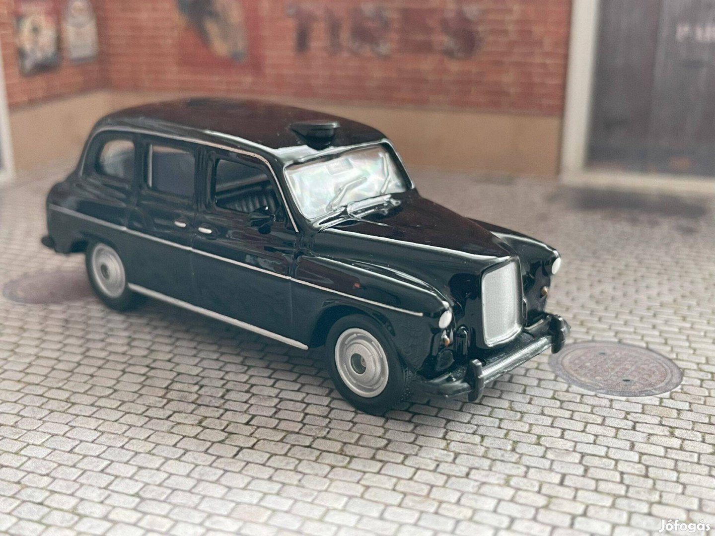 Austin London Taxi modell autó - Welly 1:64 méret