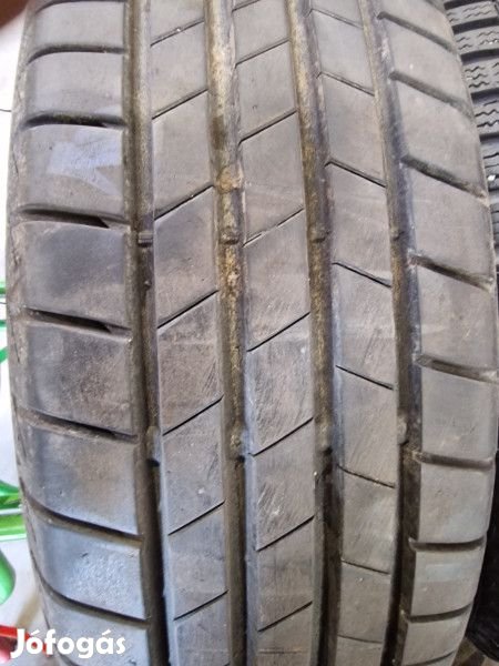 Bridgestone 185/65R15 T005 6-7mm DOT22 használt gumi HG13472 nyári