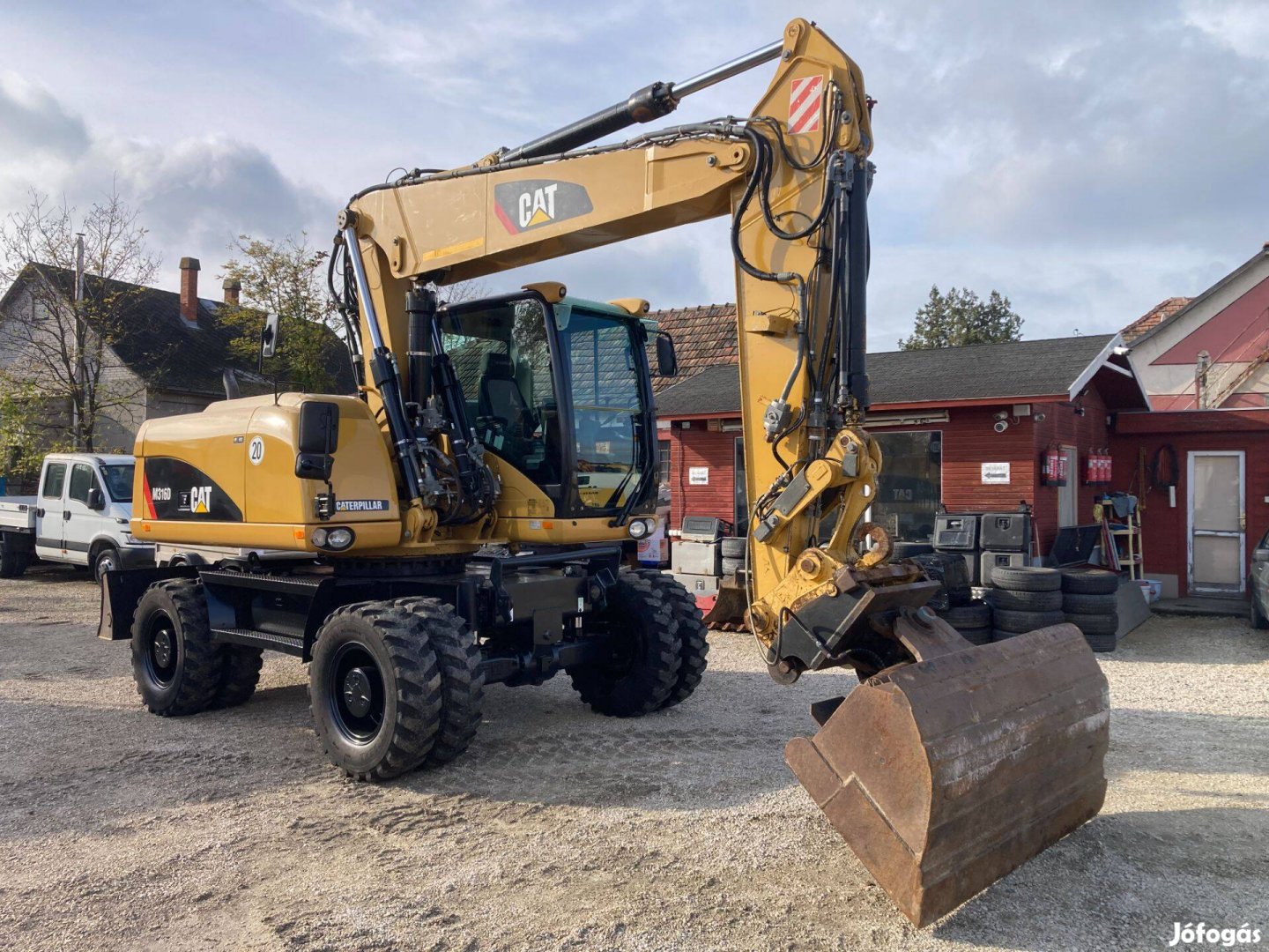 CAT Caterpillar M316D 17 t gumikerekes kotrógép klímával eladó
