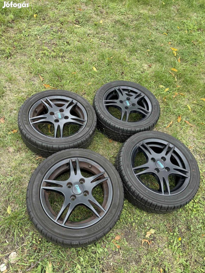 CMS gyári fekete alufelni 4x100 Yokohama185/50 R14