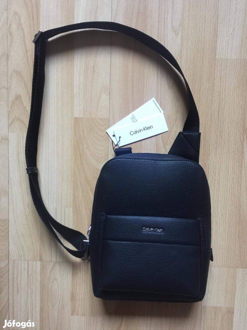 Calvin Klein - Fém márkalogós,bőr crossbody többfunkciós táska.